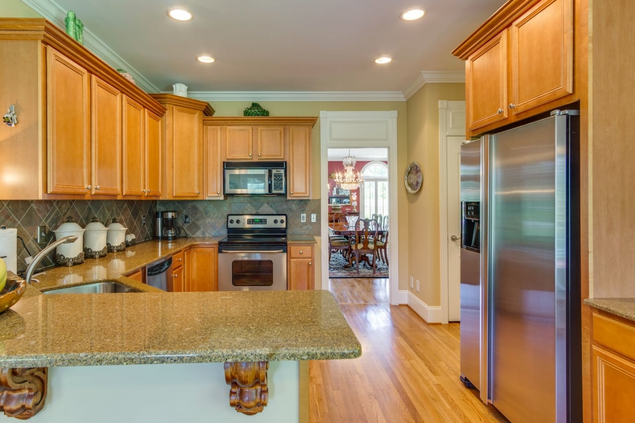 Wood-paneled kitchen.