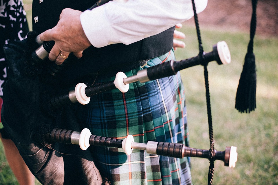A man playing bagpipes.